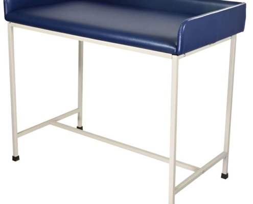 TABLE FOR BABY-NURSING Baby nursing table with cushioned top and safety side supports